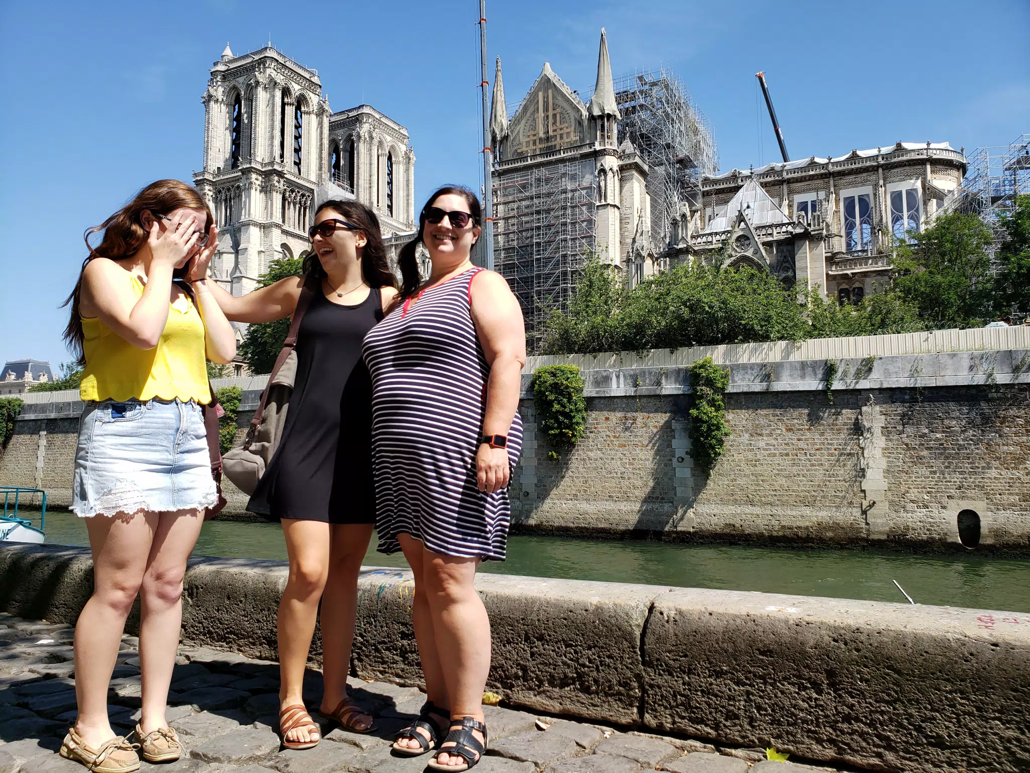 Laughing Between Photos in Paris