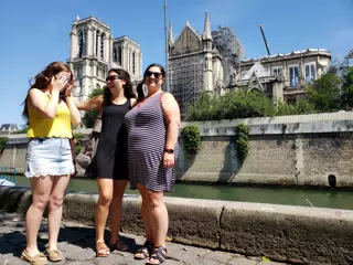Laughing Between Photos in Paris