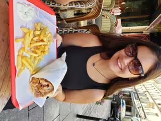 Emily with Gyro and Fries in Paris