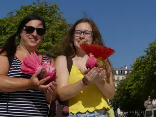 Holding Birds in the Park in Paris