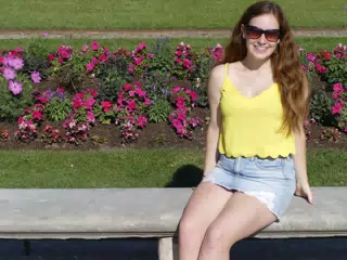 Madeline Sitting on a Bench in Paris