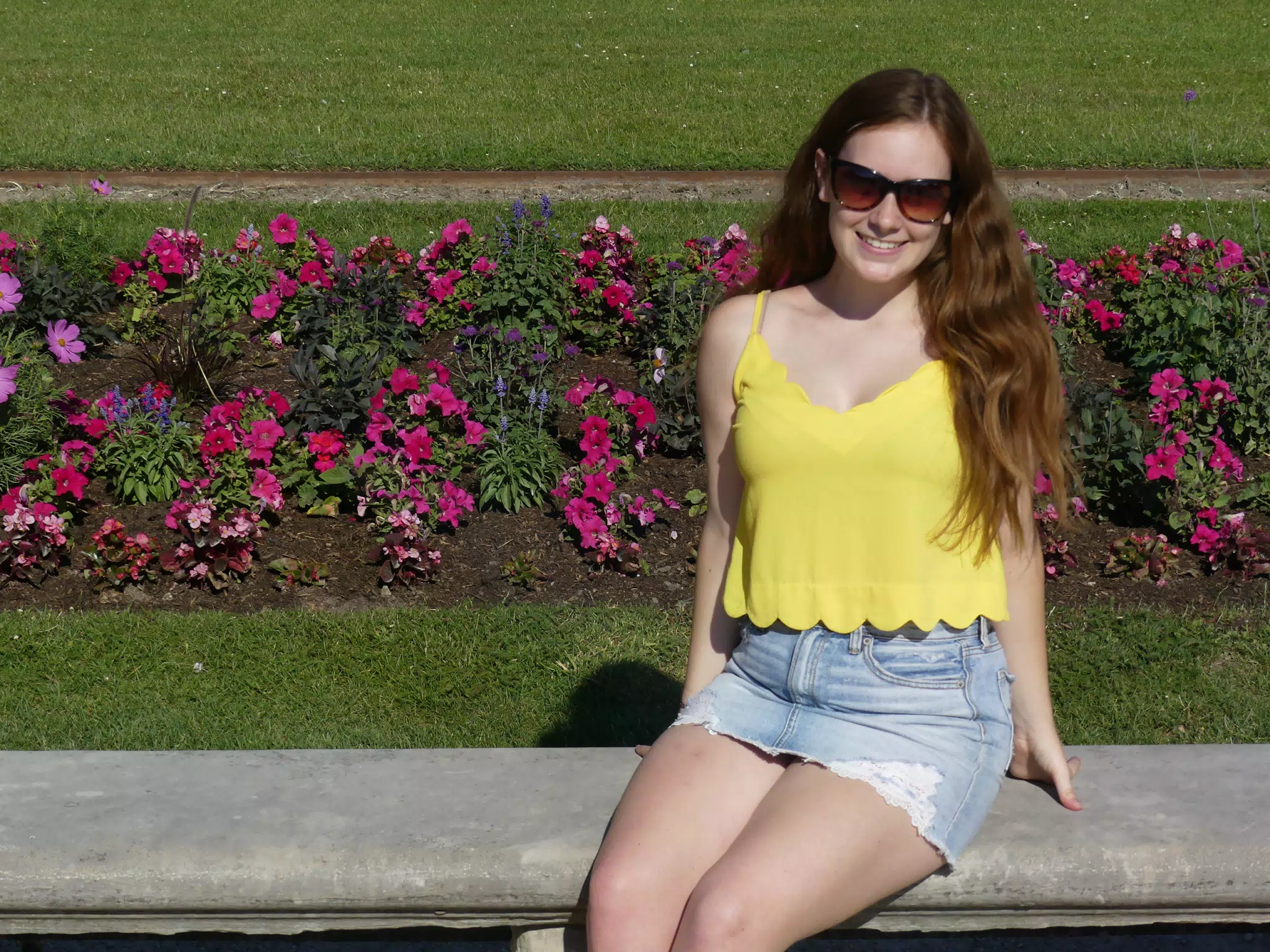 Smiling Teen in Yellow on Park Bench in Paris