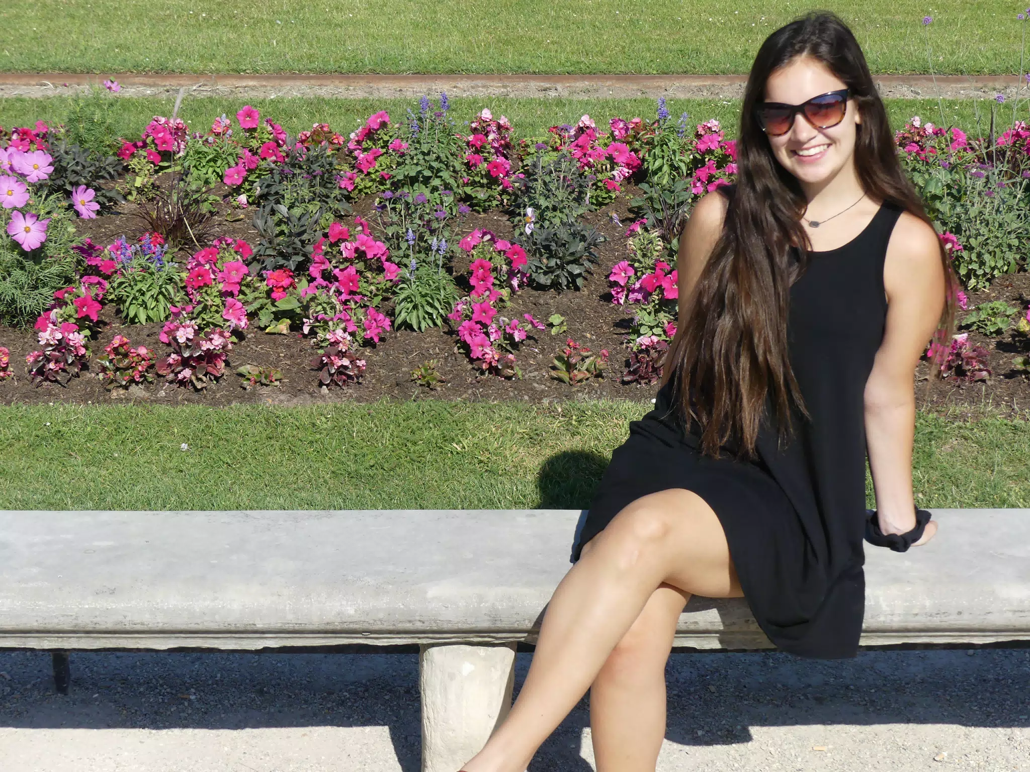Emily in Park in Black Dress and Sunglasses