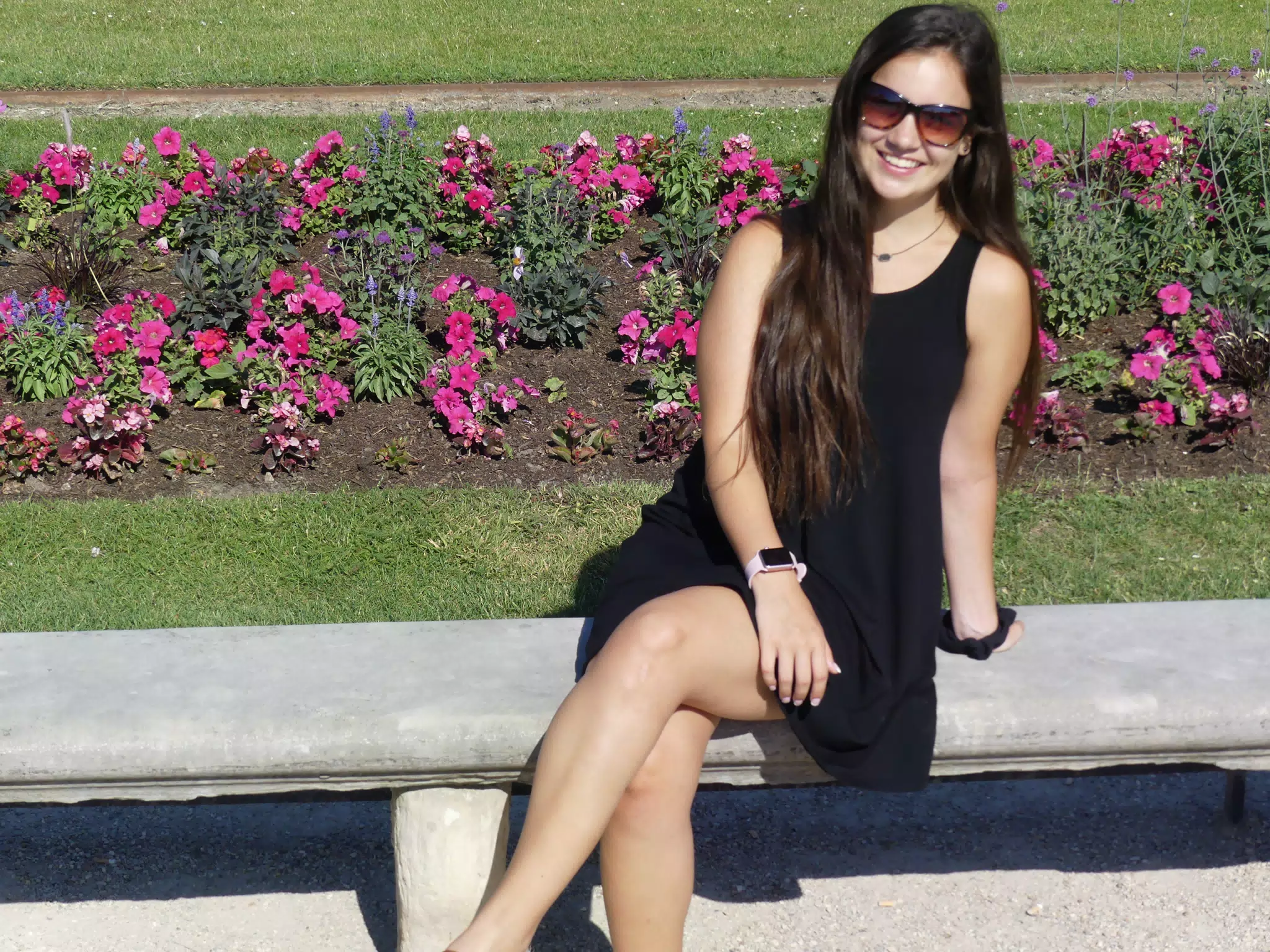 Emily in Black Dress in Parisian Park on Bench