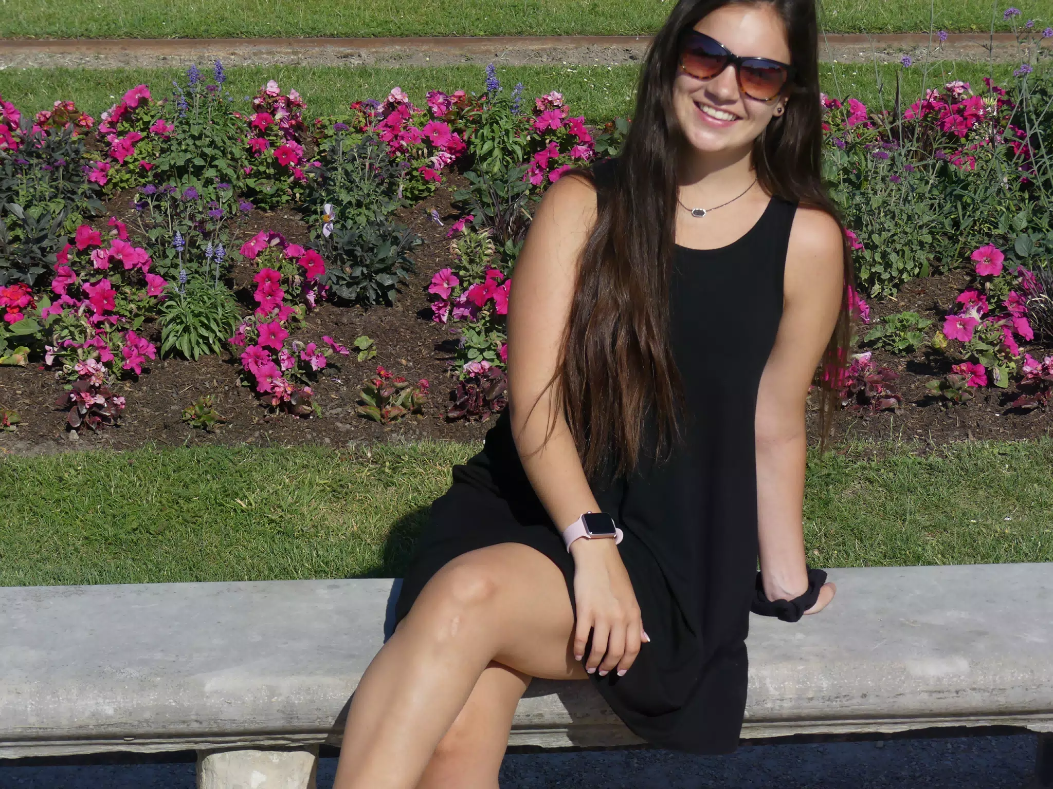 Girl on Bench in Paris with Pink Flowers
