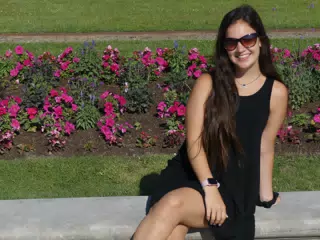 Emily in Black Dress in Paris Park