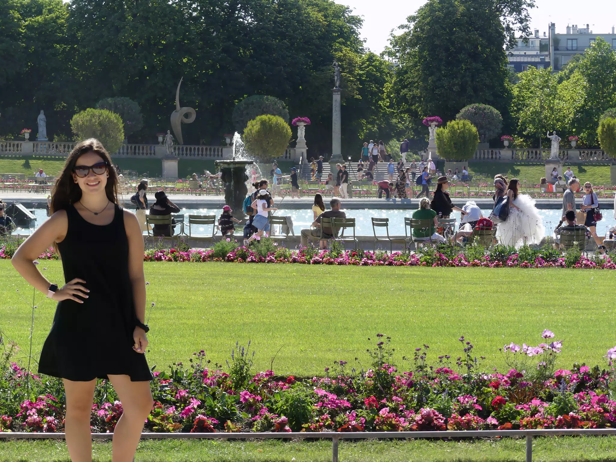 Emily in Black Dress in Park in Paris