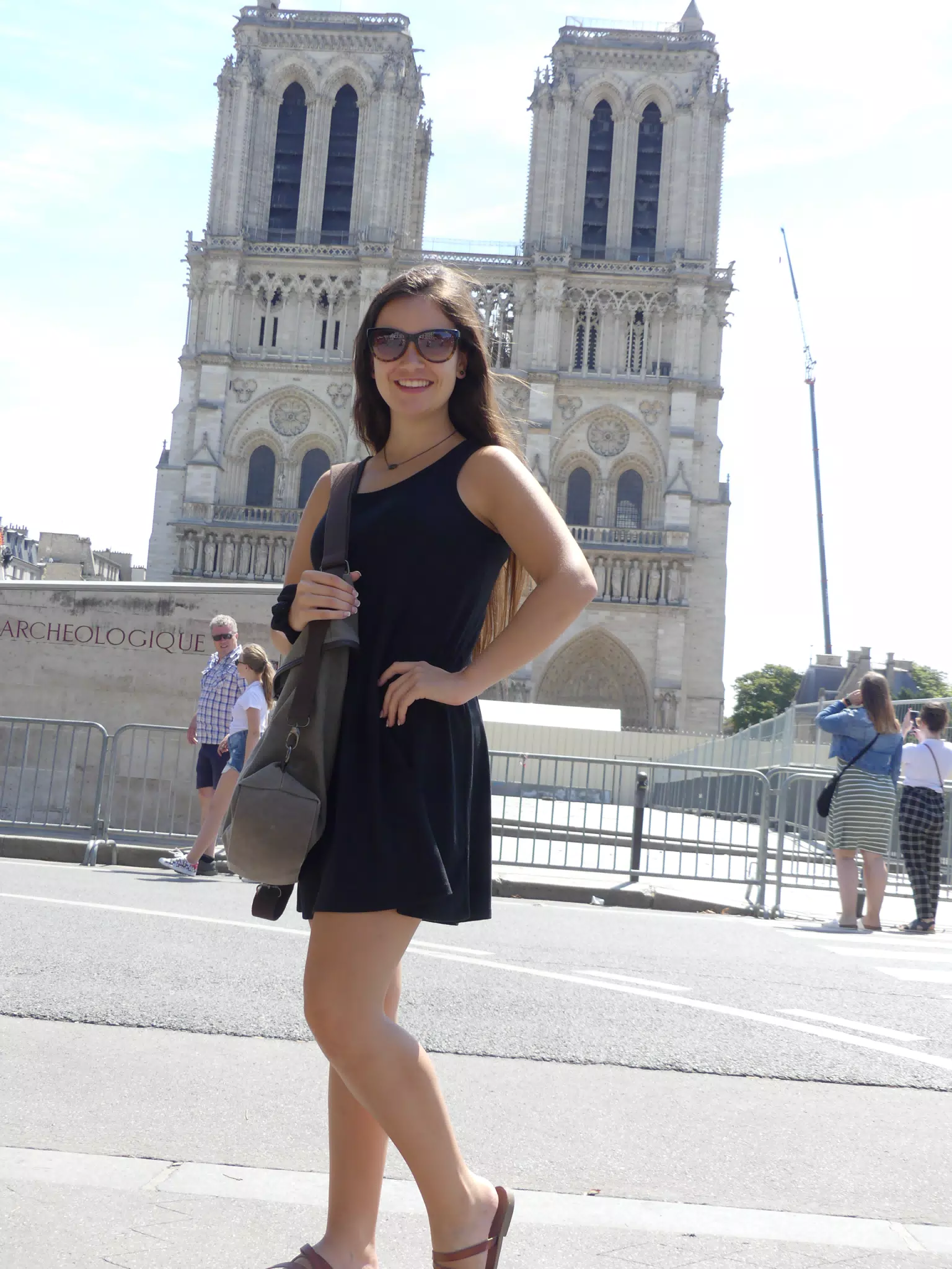 Brunette at Notre Dame in Paris