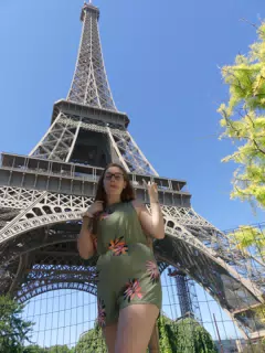 Madeline with Tongue Out at the Eiffel Tower in Romper