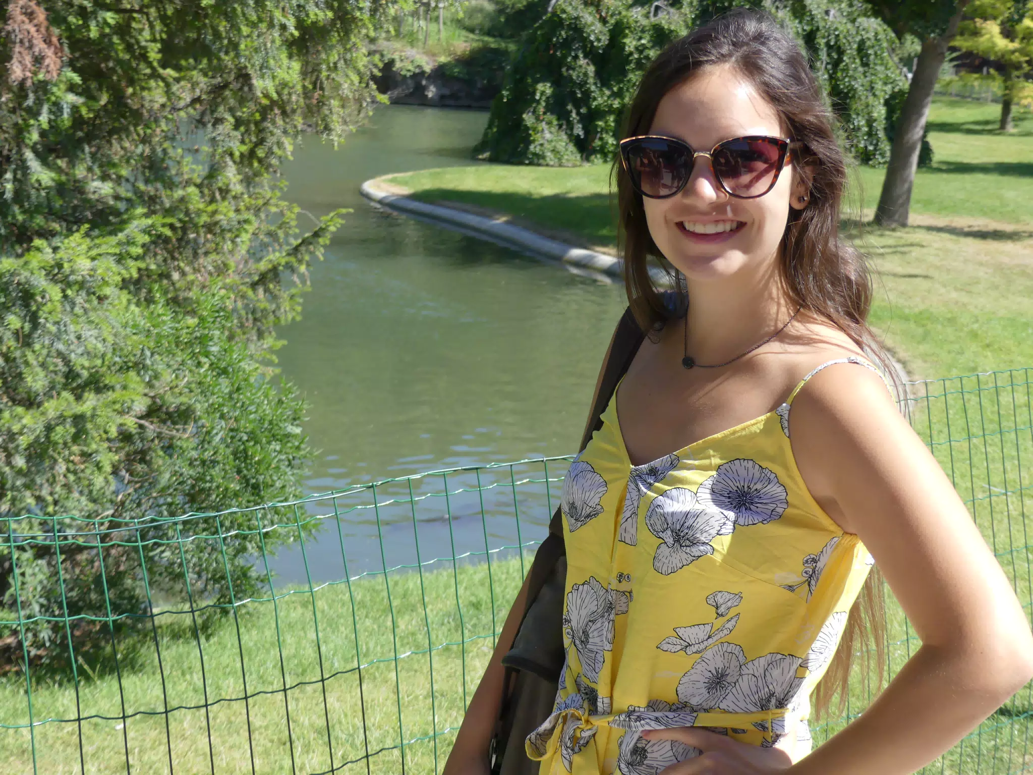 Emily Posing Under the Eiffel Tower