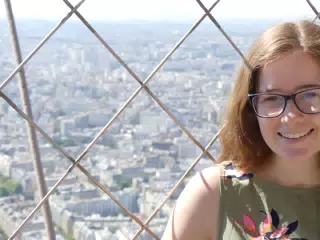 Madeline at the Top of the Eiffel Tower
