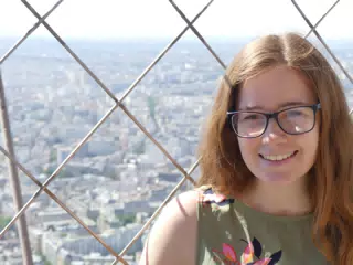 Madeline Posting on the Top of the Eiffel Tower