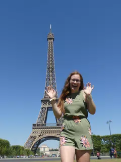 Madeline Laughing at the Eiffel Tower