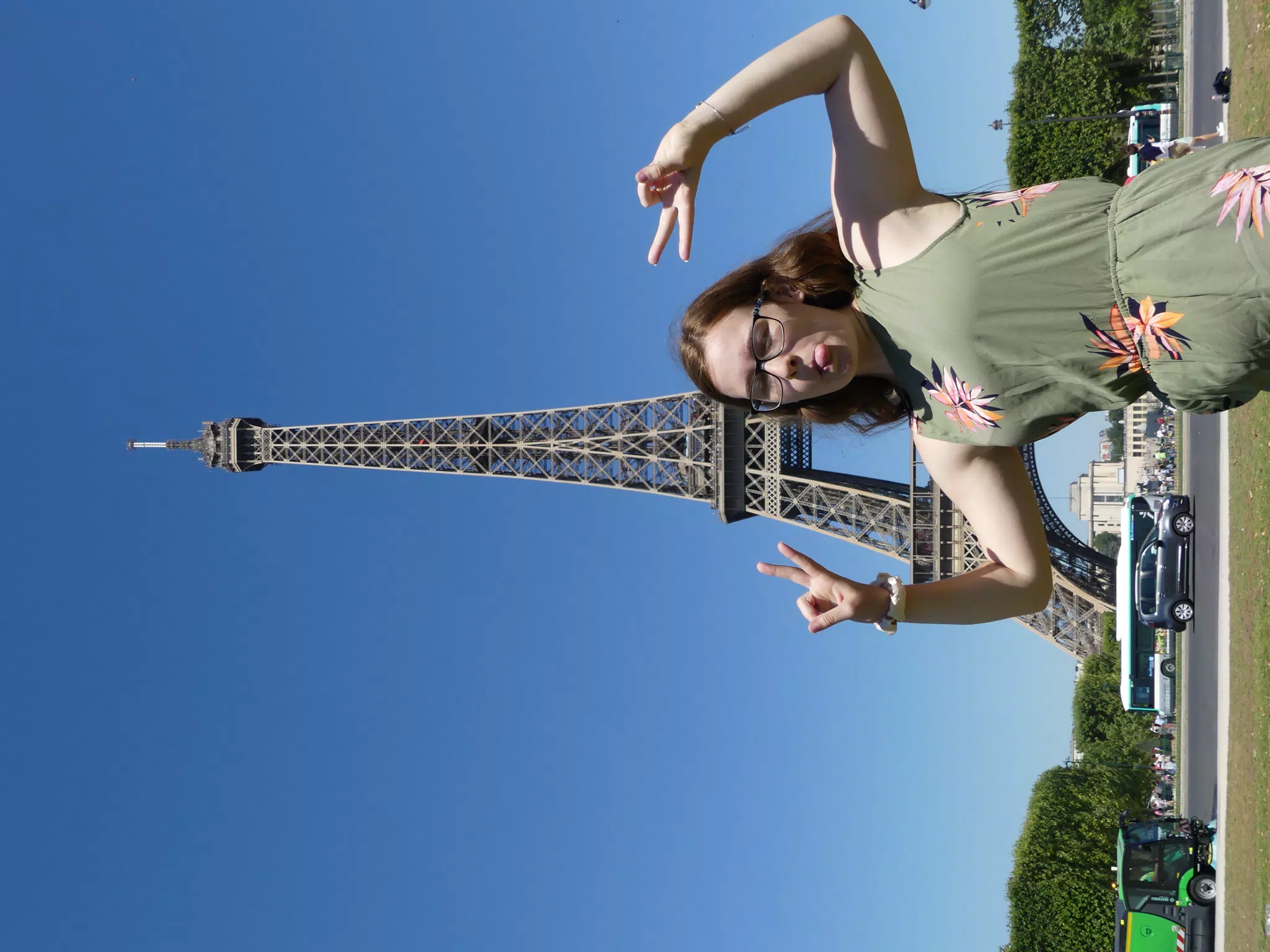 Madeline Sticking Tongue Out at the Eiffel Tower