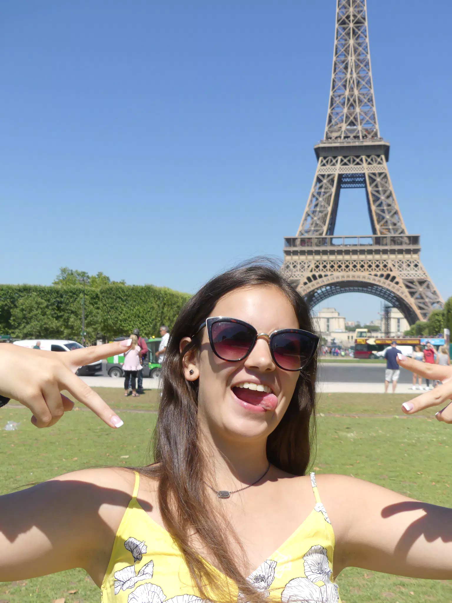 Teen with Tongue Out at Eiffel Tower
