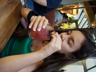 Emily with Cocktail in Paris