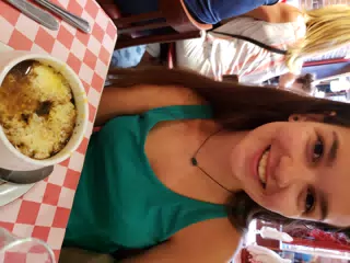 Emily with French Onion Soup in Paris