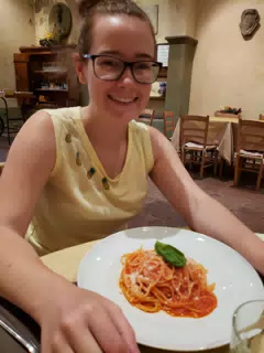 Madeline with Pasta at Le Maschere