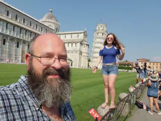 Selfie While Madeline Stands on Fence at the Leaning Tower of Pisa