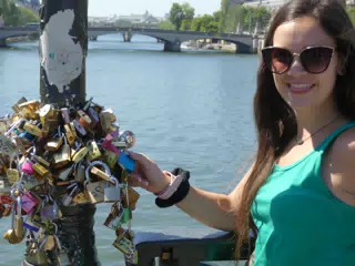 Emily with Locks on Bridge in Paris