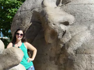 Emily with Statue in Paris
