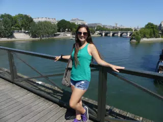 Emily Standing on Bridge in Paris