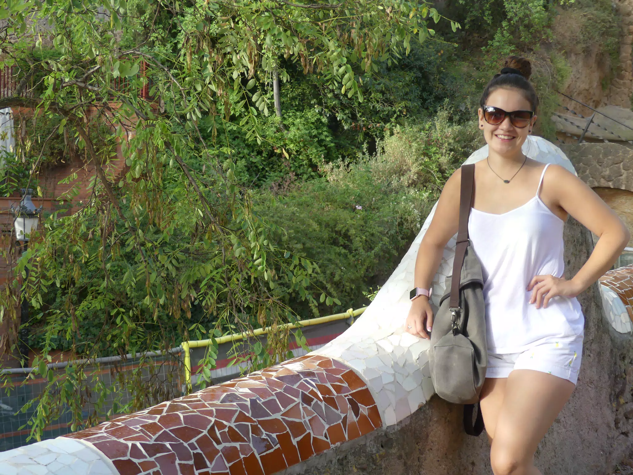 Emily in White by Railing in Park Guell
