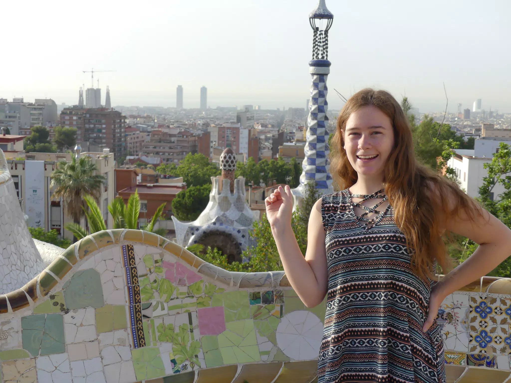 Madeline Pointing to the Tower in Park Guell, Barcelona