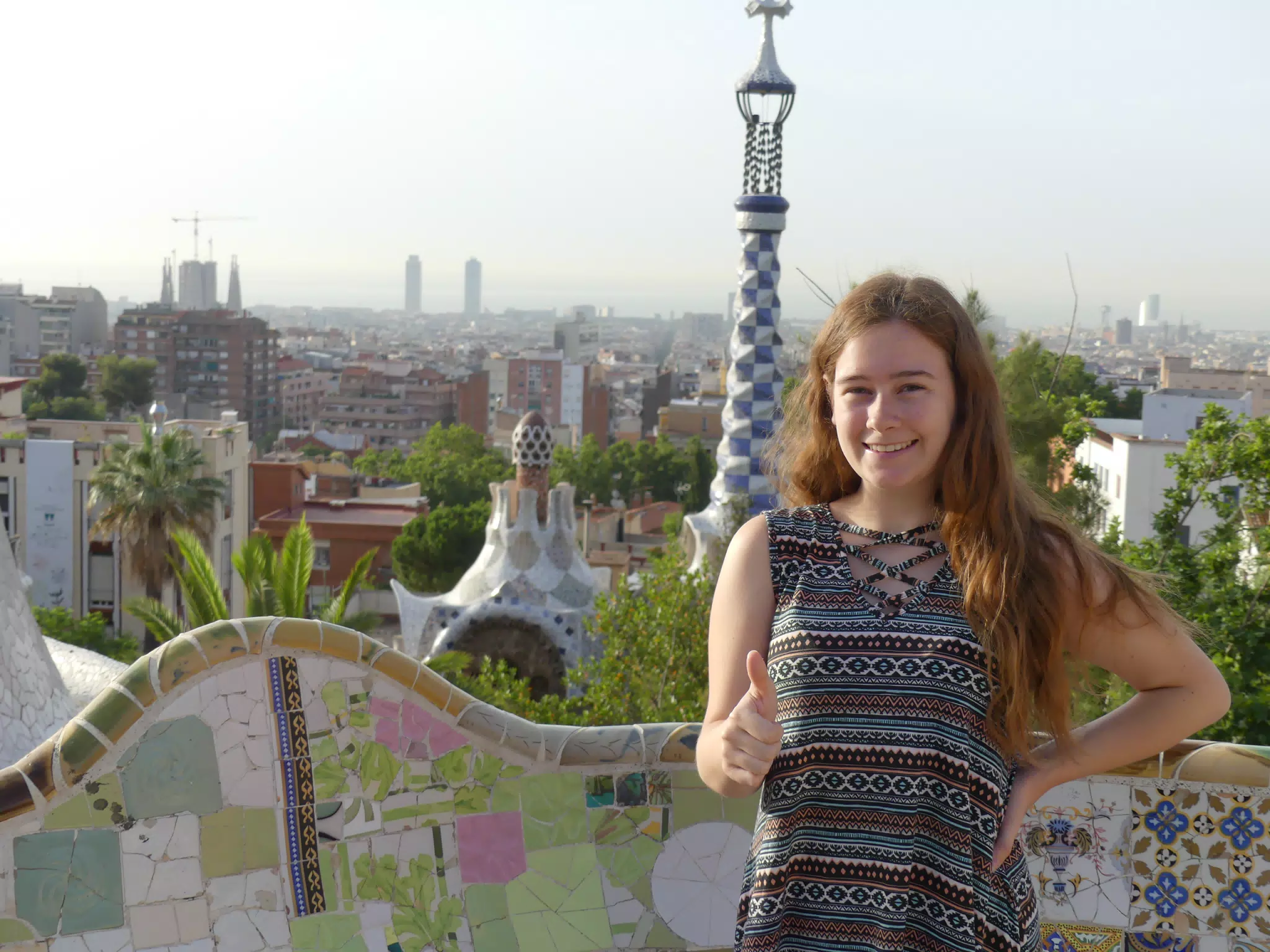 Madeline Thumbs Up in Park Guell over Barcelona