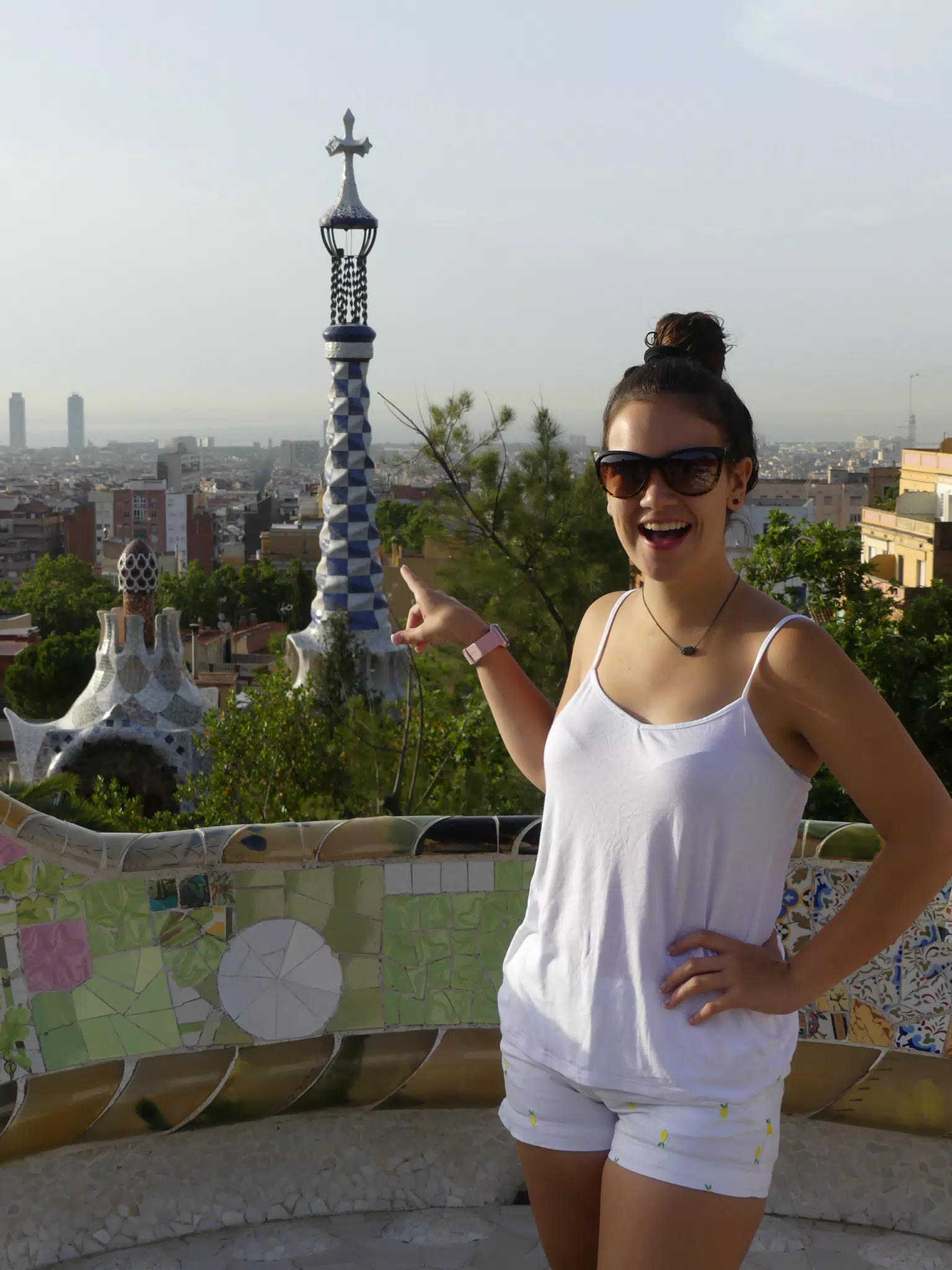 Emily Pointing at Tower in Barcelona