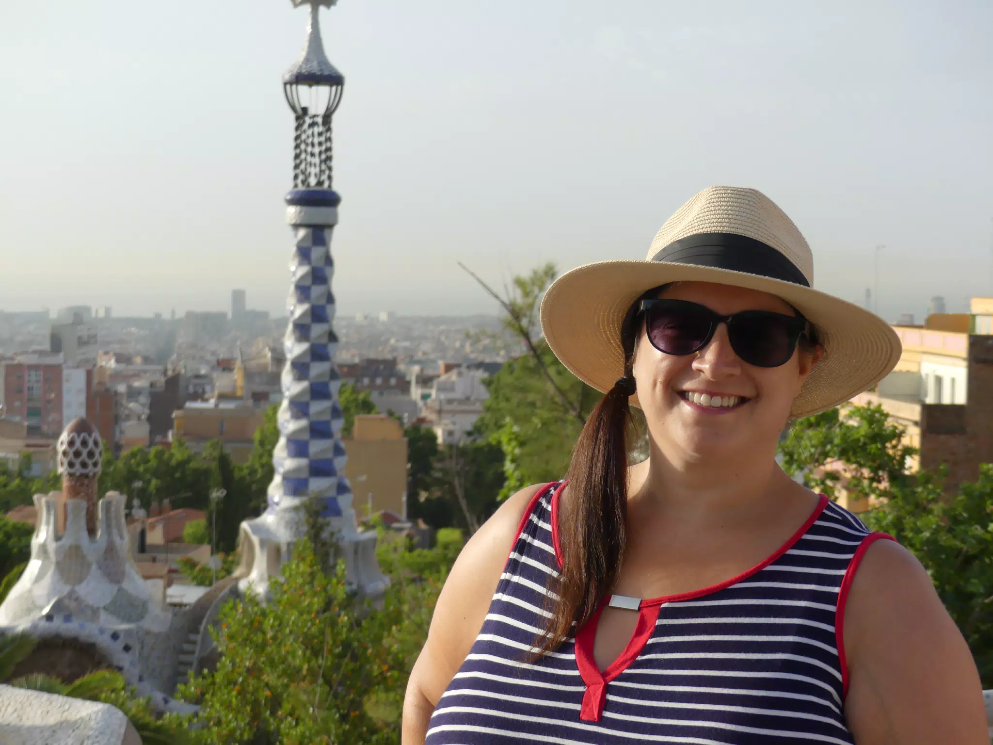 Dominica in Park Guell in Barcelona in Hat