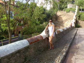 Emily in White Shorts Posing in Park Guell, Barcelona, Spain