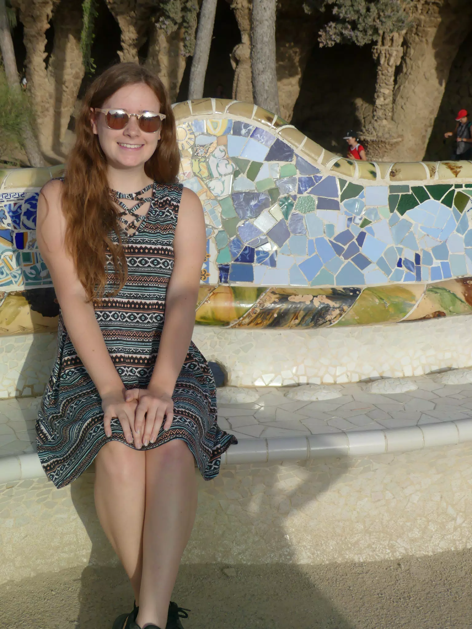 Madeline Sitting in Dress in Park Guell