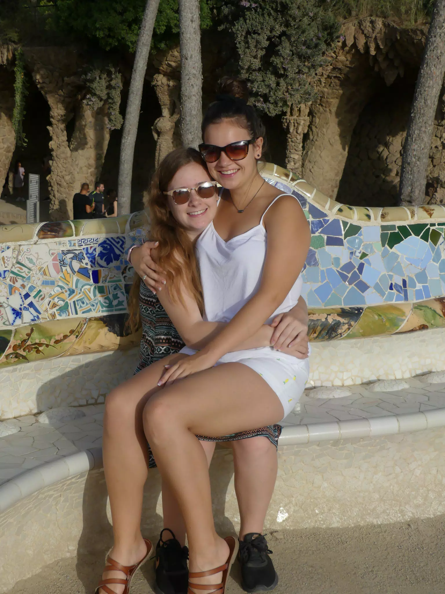 Emily Sitting on Madeline's Lap in Park Guell