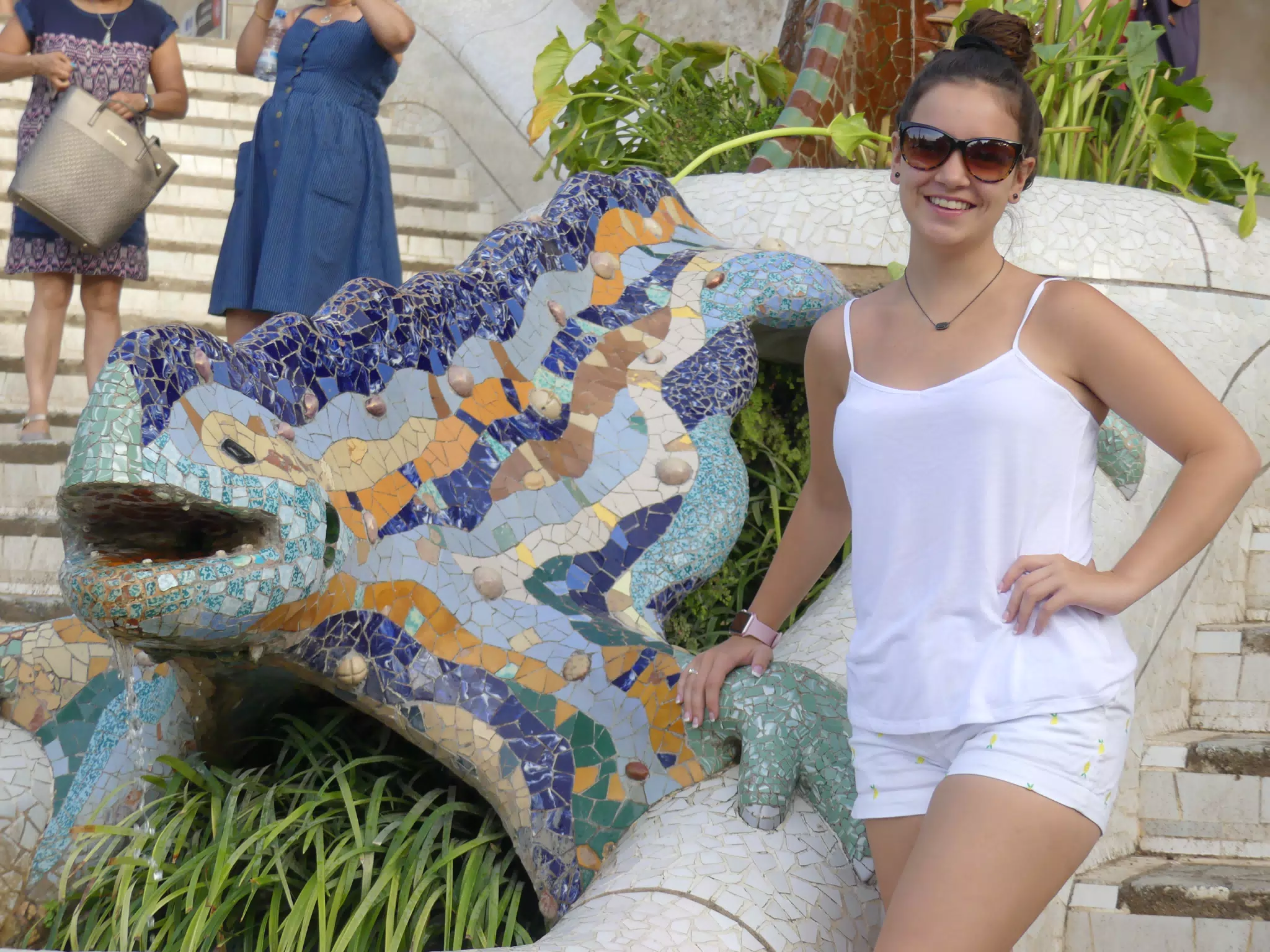 Emily in White by the Gecko at Park Guell in Barcelona