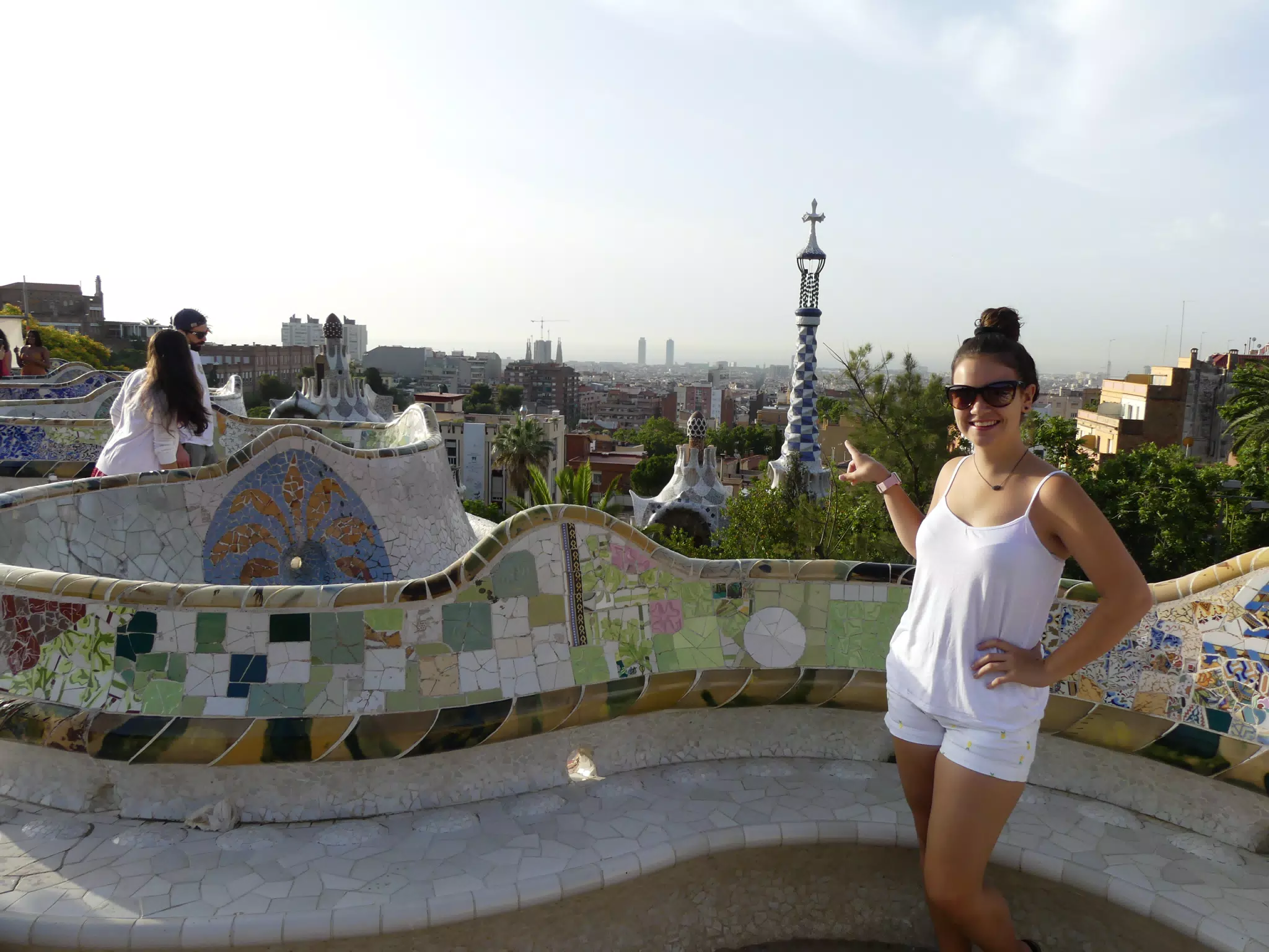 Emily Pointing to the Sea in Barcelona from Park Guell