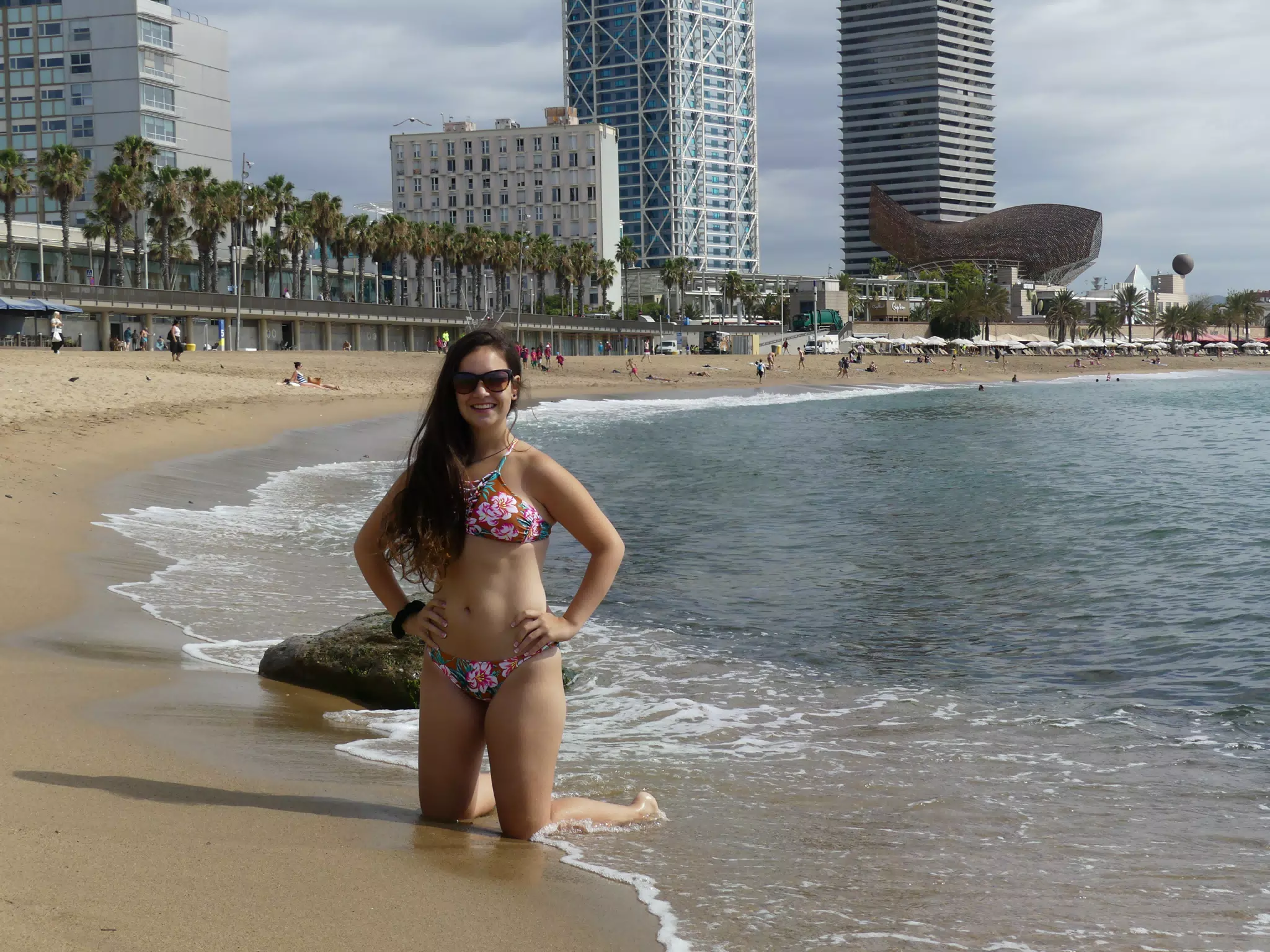 Girl Kneeling on Barcelona Beach