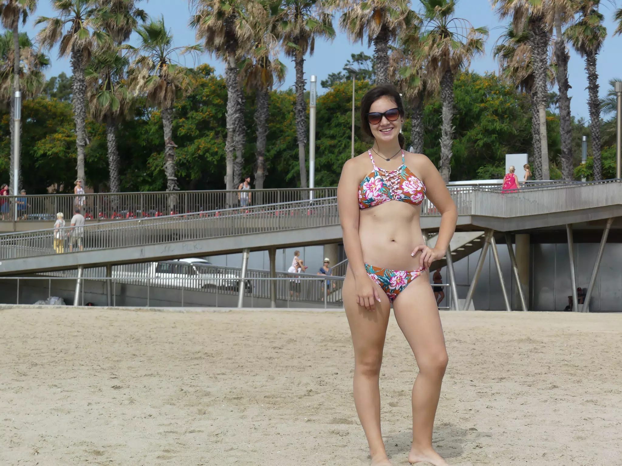 Girl Posing on Beach in Bathing Attire