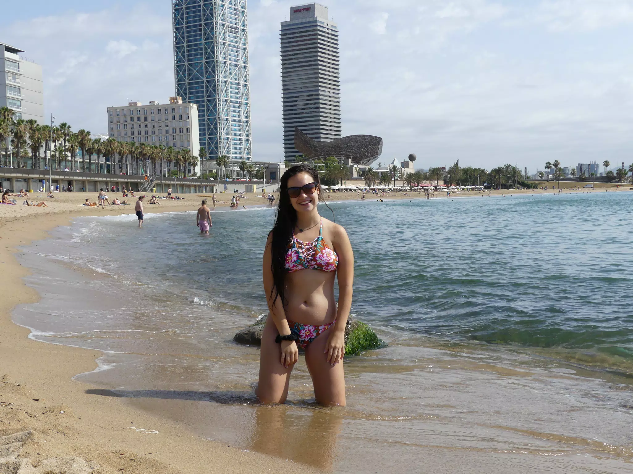 Teen Bikini Model on Knees in Ocean