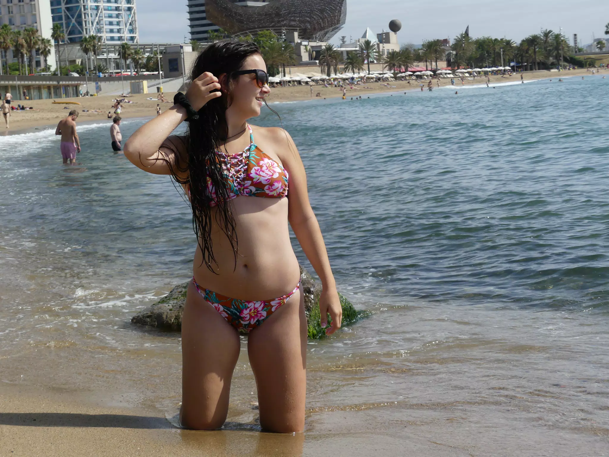 Emily on Knees on Beach in Barcelona