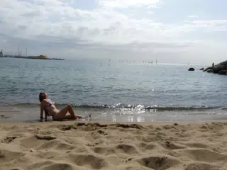 Emily Posing on the Beach at Barcelonetta, Barcelona