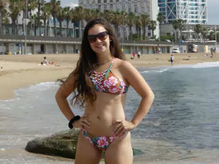 Brunette in Bikini on Beach in Barcelona, Spain