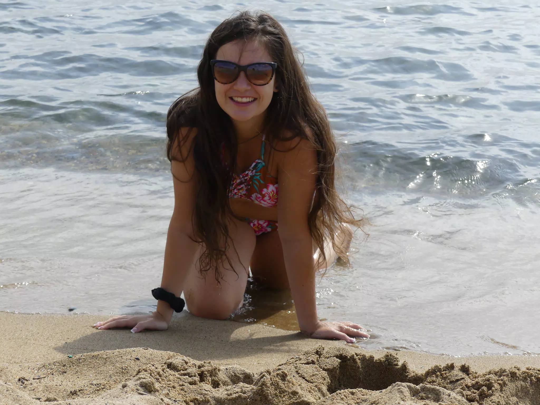 Swimsuit Model Crawling on Beach in Barcelona