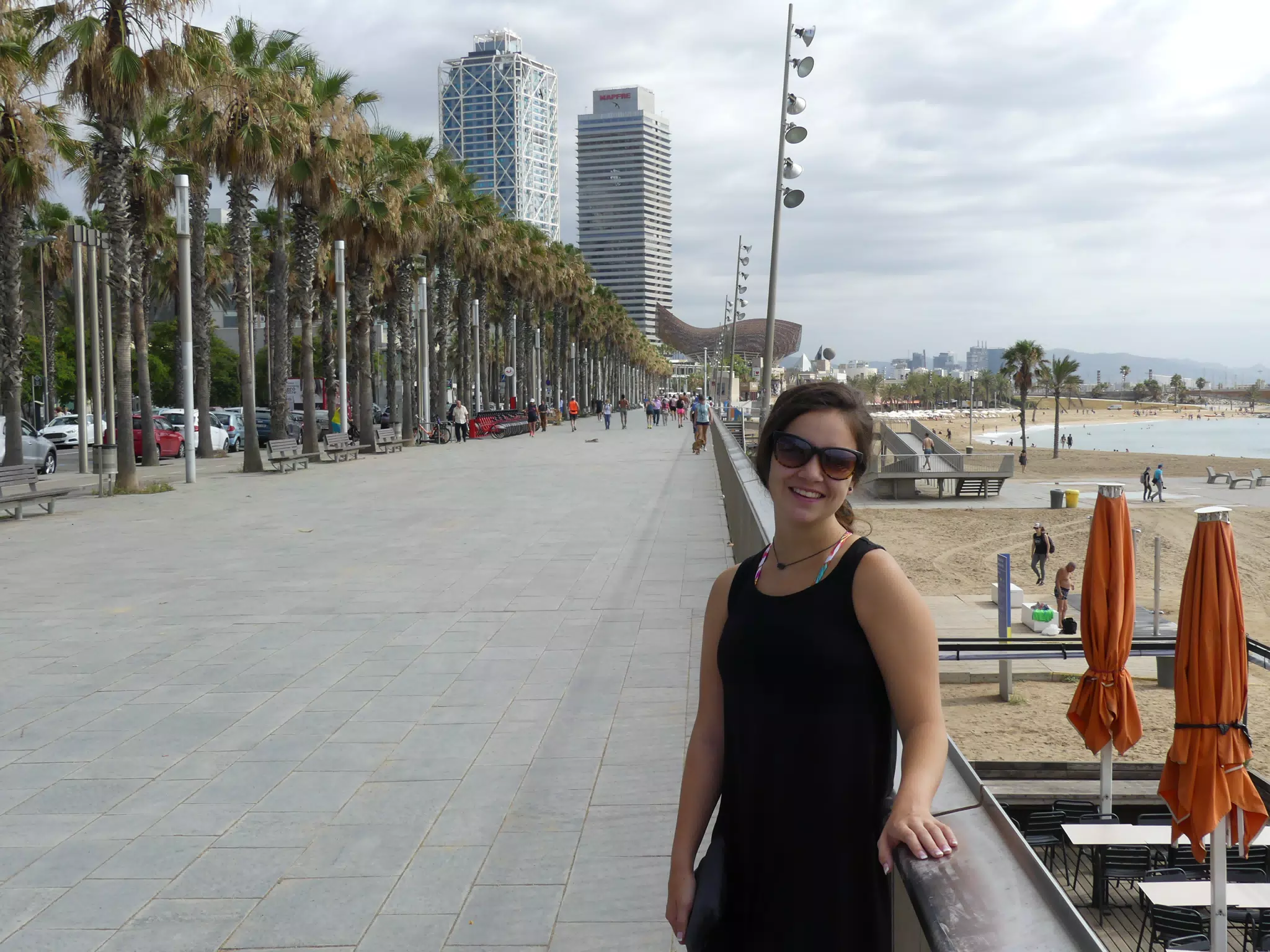 Emily Standing Along Barcelona Boardwalk