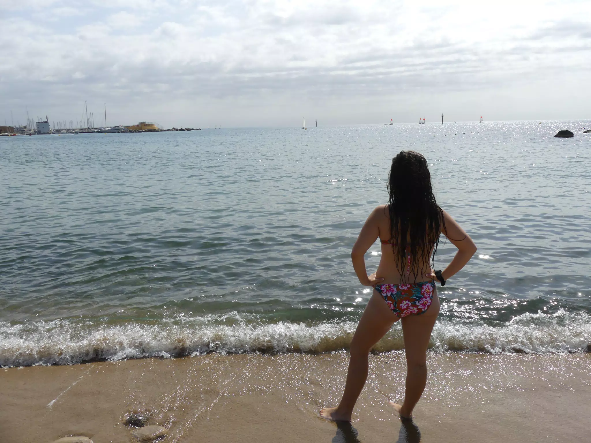 Emily Looking Out to Sea in Barcelona