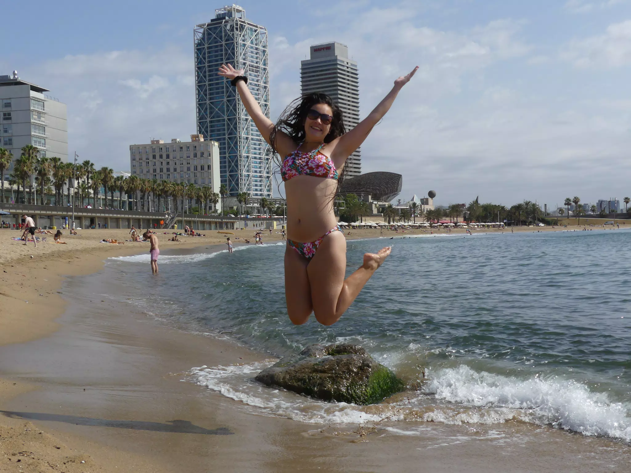 Emily Jumping on Barcelonetta Beach in Barcelona