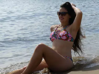 Brunette Relaxing on Barcelona Beach