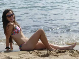 Emily Laughing on Barcelona Beach Sand