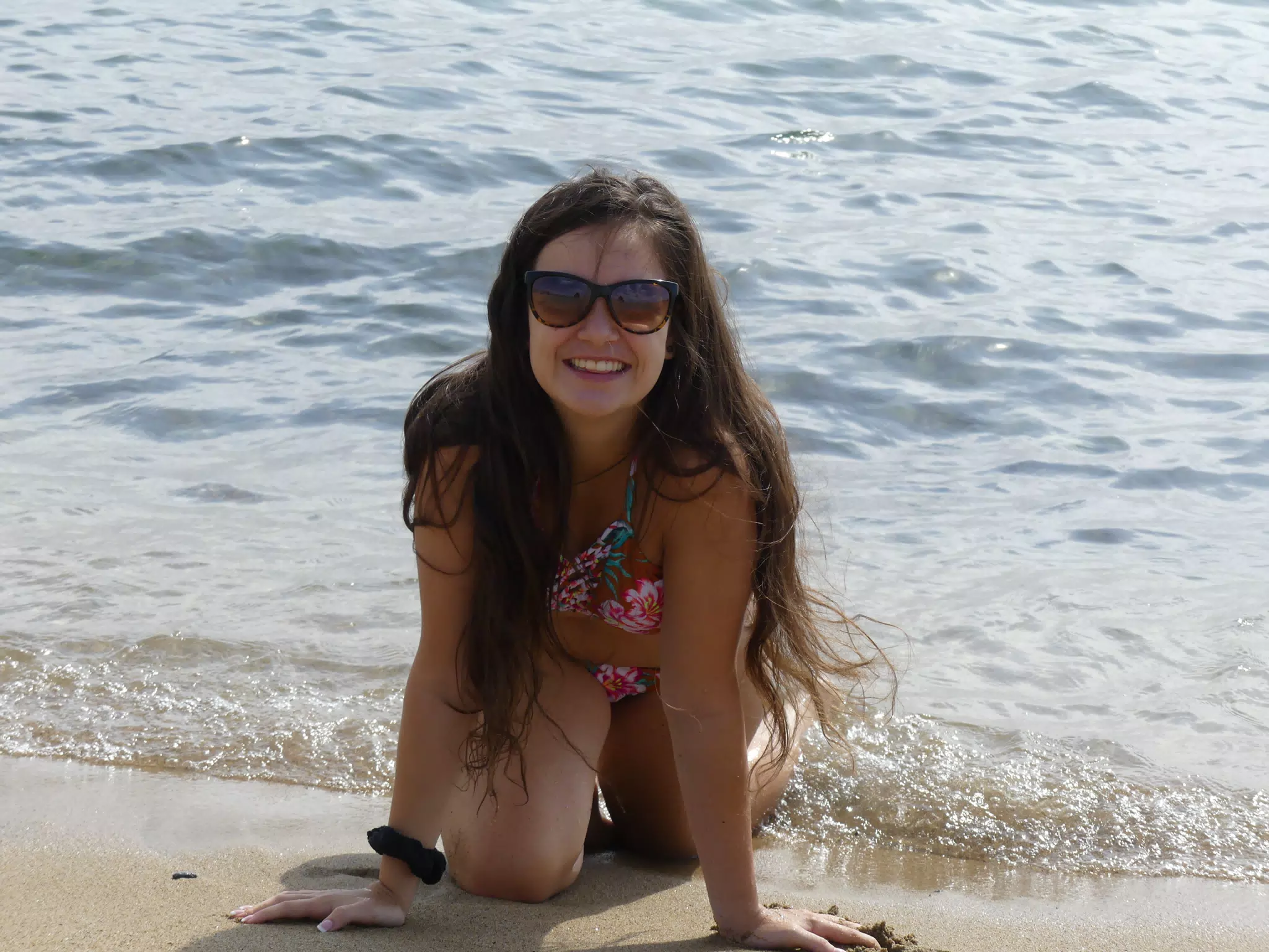 Brunette Model Crawling on Barcelona Beach