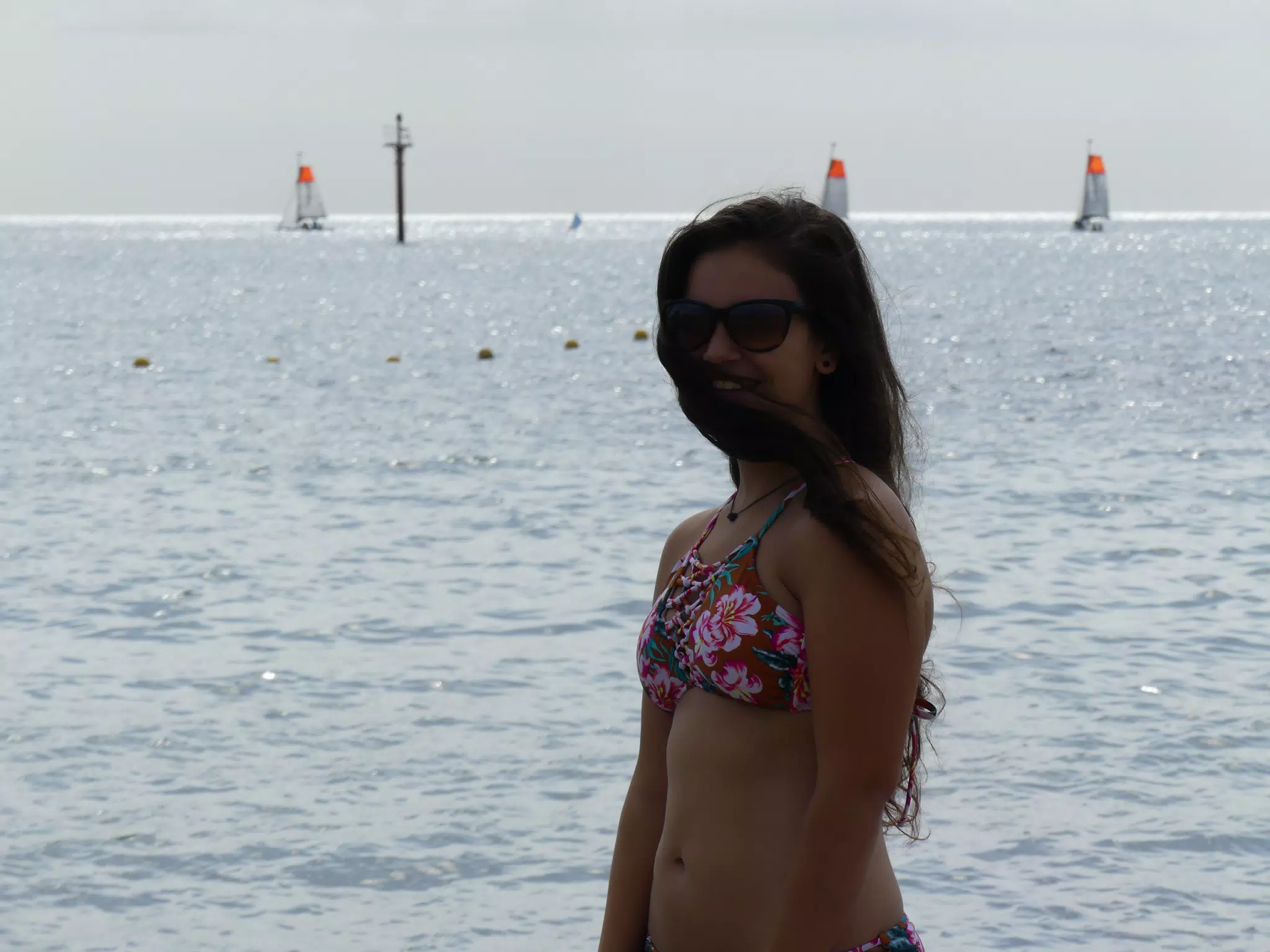 Emily in Shadows Against the Sea